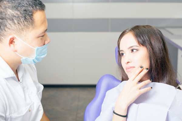 Woman receiving gentle dental care at Elite Dental & Wellness in Mesa, AZ
