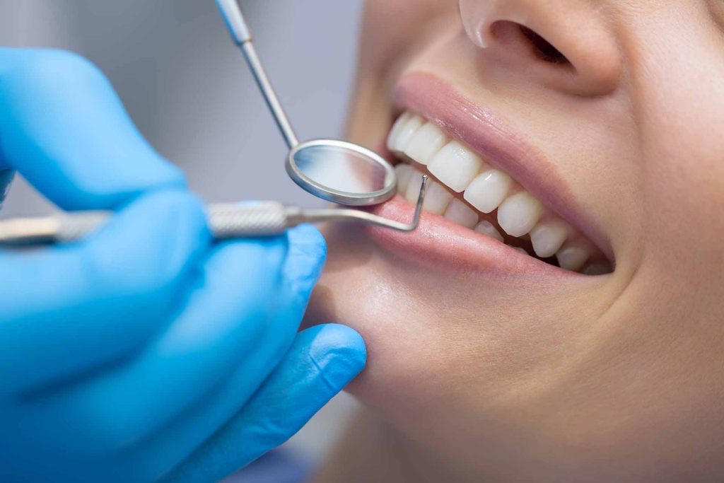 Patient receiving a holistic dental exam at Elite Dental & Wellness in Mesa, AZ